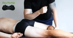 Piriformis syndrome relief Lying on a massage table, the therapist uses elbows to deeply press buttocks to release tight muscles and relieve sciatica